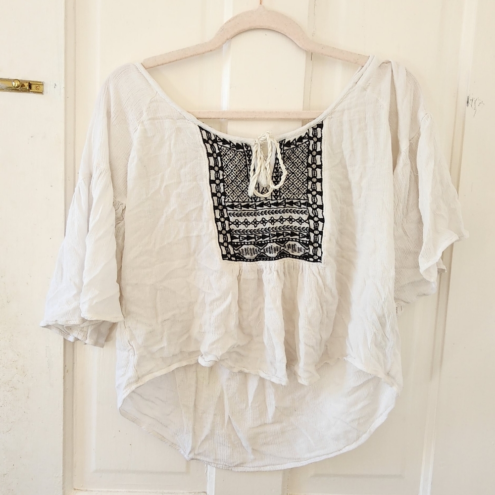 Peasant style blouse with black embroidered pattern